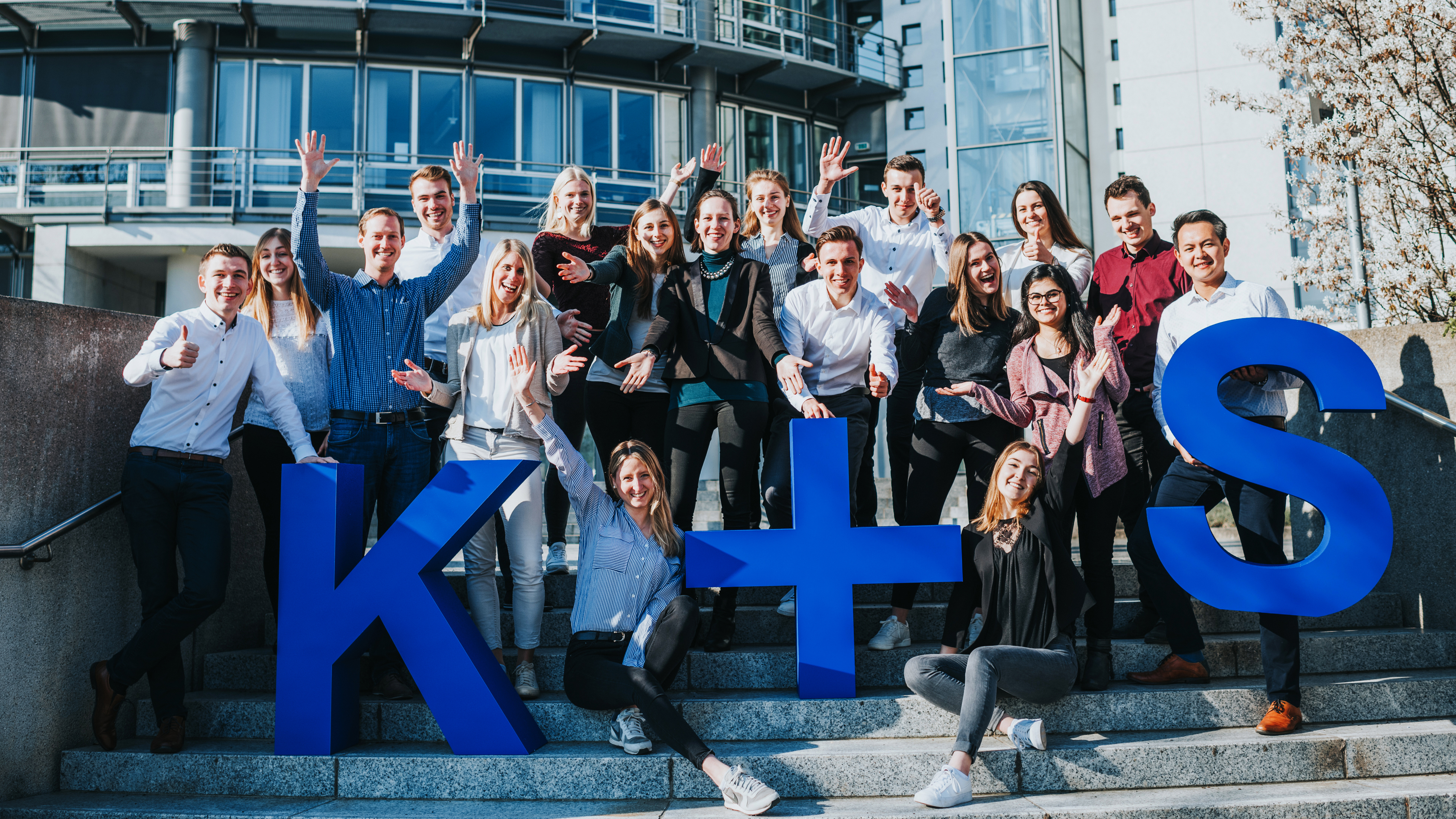 Young employees of K+S in front of the headquarters in Kassel